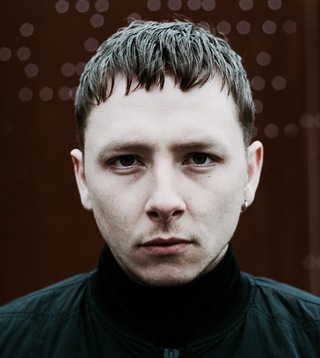 Oliver Gibson London based DJ and producer, forms an intersection between Post-Punk, EBM, Darkwave, Industrial and Rave. Cutting his teeth as an artist in London’s clubs and warehouses, Oliver’s sonic interests lay in a non-purist approach, a resistance against convention.